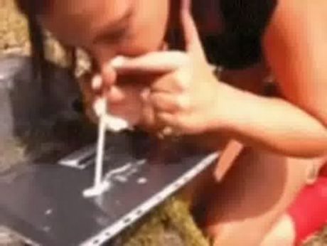 girl doing a line off cum