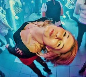 Tipsy redhead chick on the dancefloor