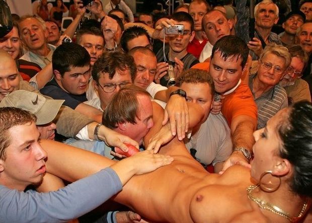 Naked crowd surfing