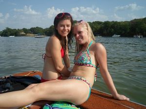blonde and brunette bikini babes on the lake