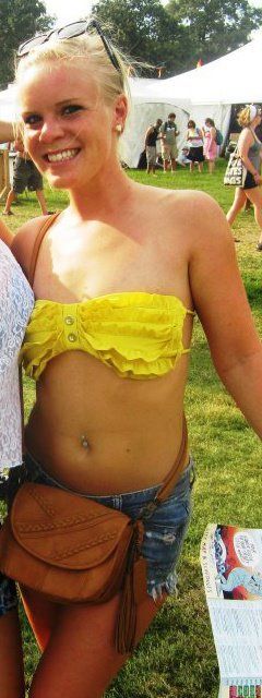 cute blonde with nice body outdoors not hiding much