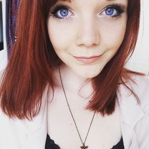 Redhead with Big Blue Eyes