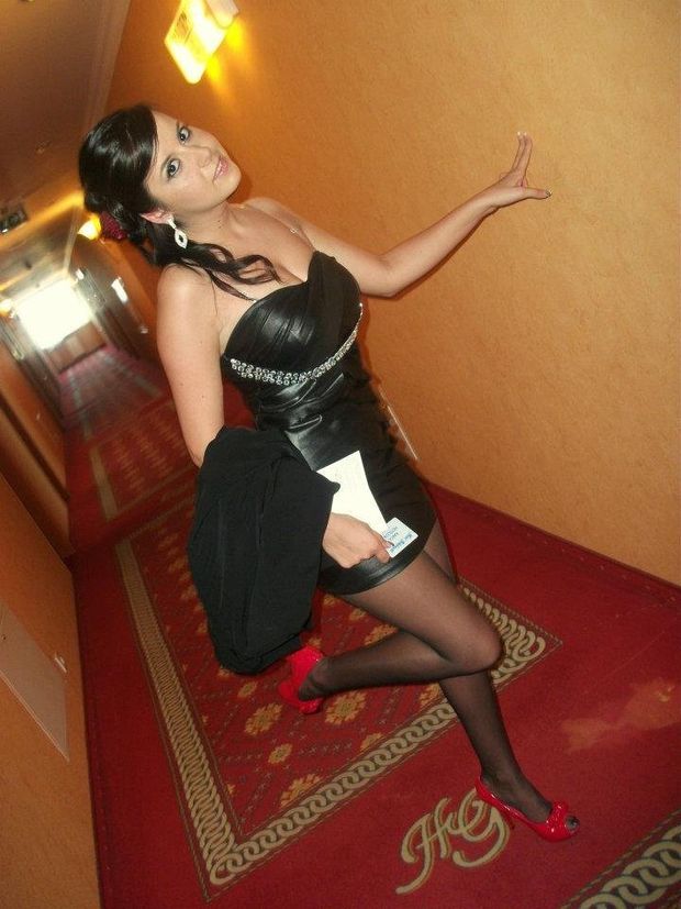 Cheeky and horny hotel slut in tight mini leather dress and high heels