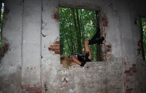 Hot latex girl in abandoned building