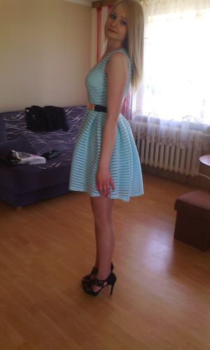 Nice blonde girl going out in new cute outfit