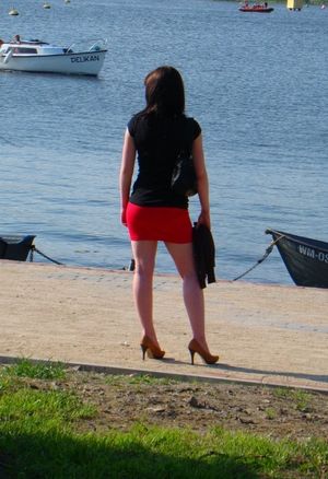 Hooking up, in tight red mini skirt