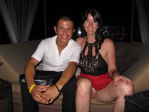 Pearl thong showing under her red dress