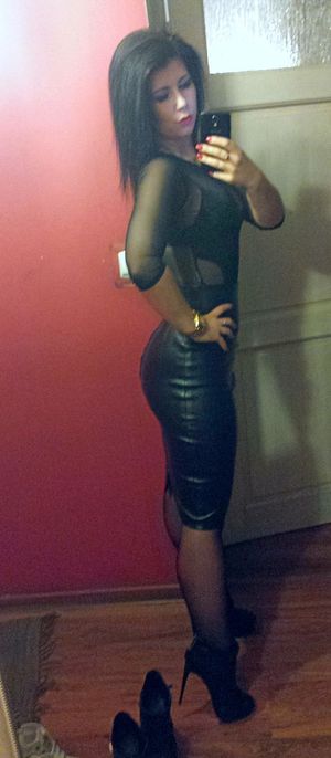 Selfie in leather tight dress