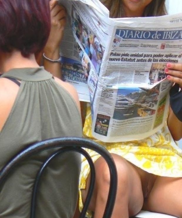 Out at cafe reading paper without her panties