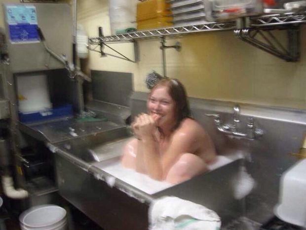 In the fast food restaurant sink washing the tub