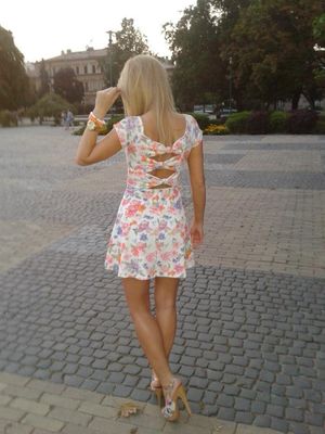 Blonde chick on the town square