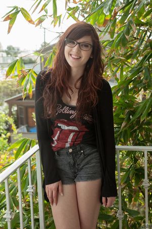 Teen Ellena Woods in glasses