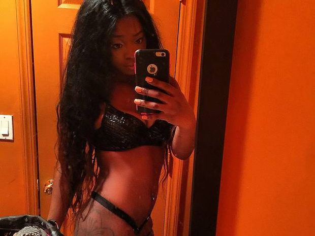 ebony sugar baby with toys