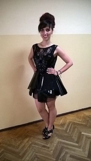 Hot brunette in latex - see thru dress