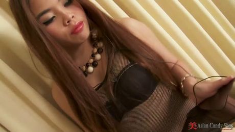 Slutty Thai teen Tan in solo toy masturbation fun!