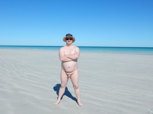 Me at the beach, wearing my HolyTrainer v2 chastity cage!