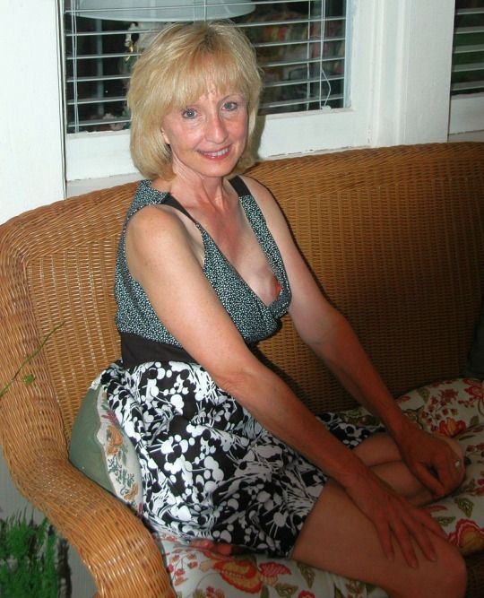 SEXY BLONDE GRANNY HAS A NIP SLIP