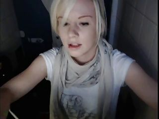 Hot English blonde fingers her pussy in public toilet