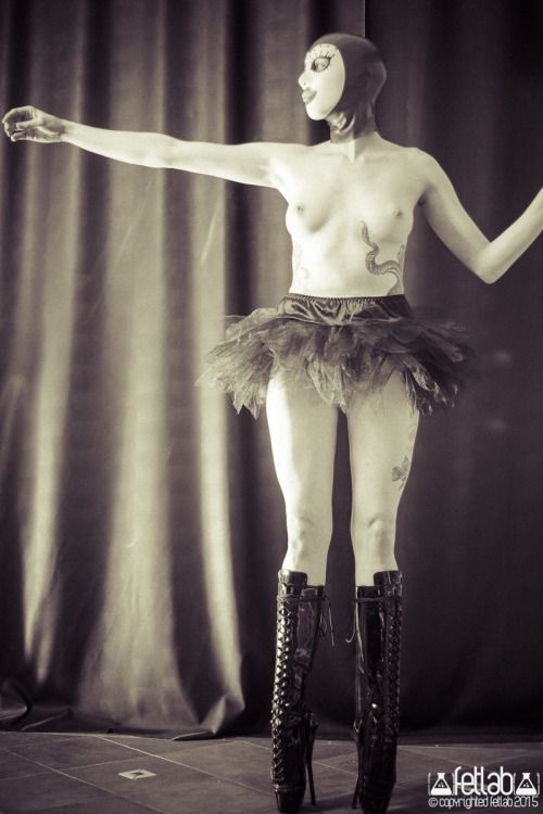 Ballerina S. on ballet boots with a latex mask from...