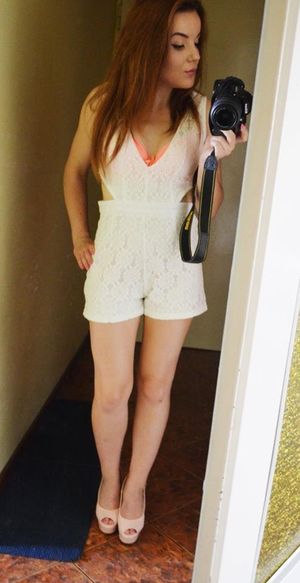 Redhead taking selfie before going out