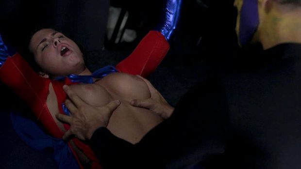 The villain squeezing Crystallin's boobs
