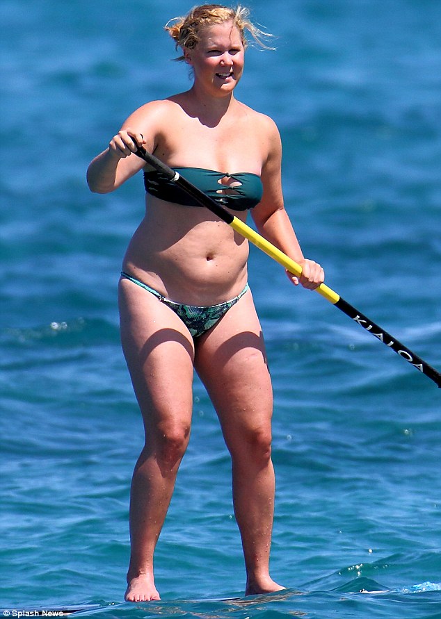 Fun in the sun: Amy Schumer was pictured enjoying a Paddle Boarding session in Kona, Hawaii on Thursday