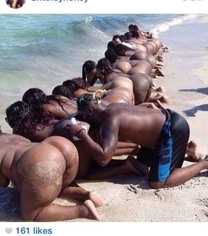 sexy black asses bent over on the beach