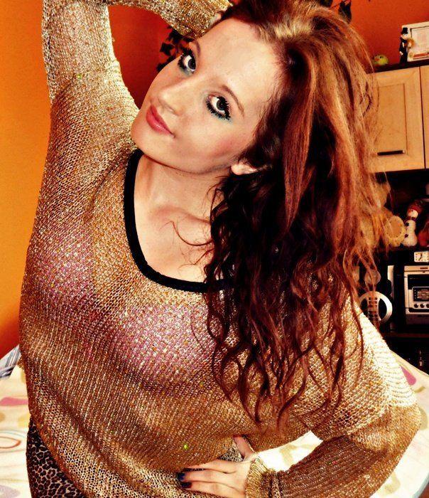 Redhead bimbo in seethru blouse