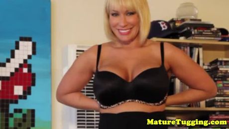 Bigass mature jerking a cock after striptease