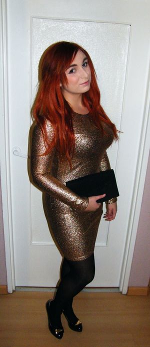 Busty and curvy redhead chick posing before night out in her sparky tight dress