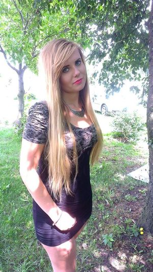 Cute sexy blonde babe posing outdoors