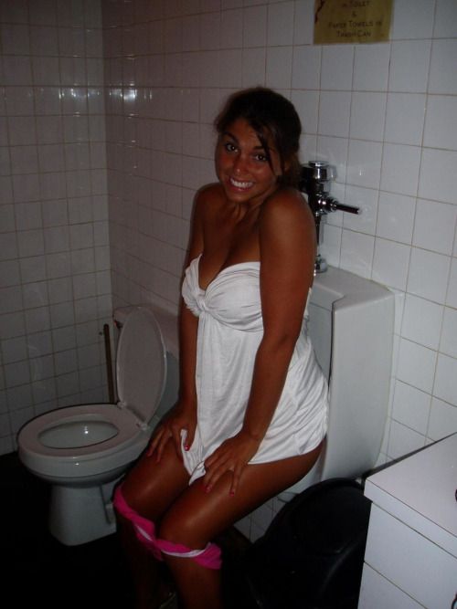 pi55ie:

Very hot amateur peeing in the urinal!