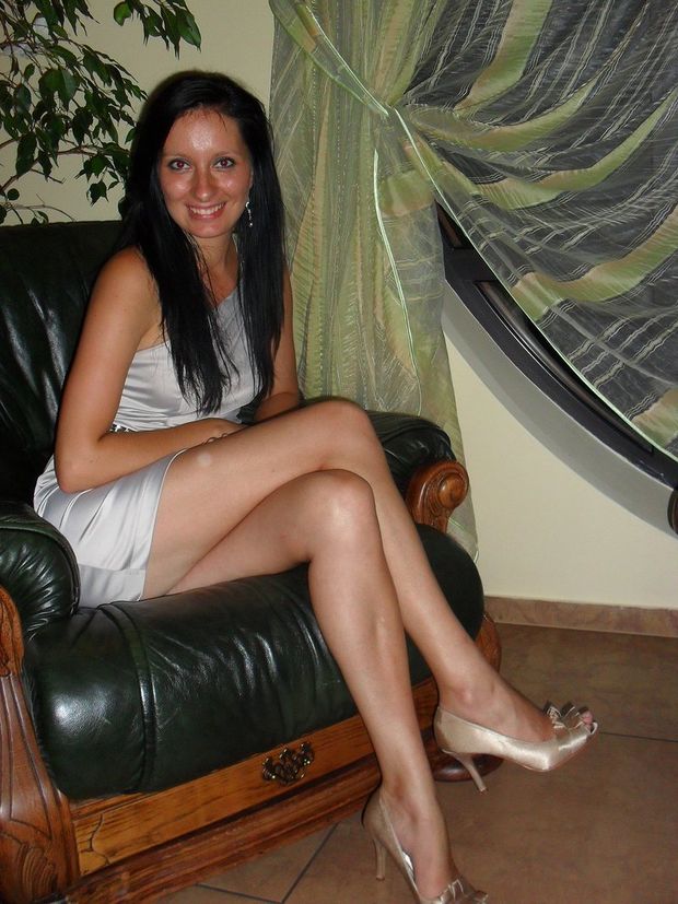Homemade pic of dark hair leggy brunette wearing tight silk dress