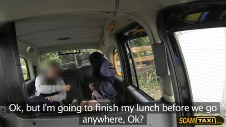 Sexy brunette customer gets hopped in the taxi while the driver is having his lunch. This sexy customer seduces him while he is eating.