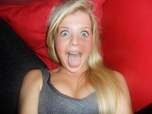 Big tits, wide eyes, tongue out