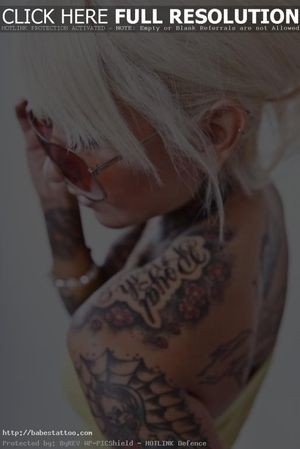Blonde full body tattoo babe with super sexy ink sin and tan pussy