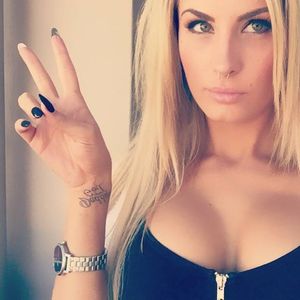 Busty blonde amateur tattooed babe show her super tits