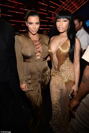 The golden girls: Kim and Nicki Minaj later compared their gilt dresses