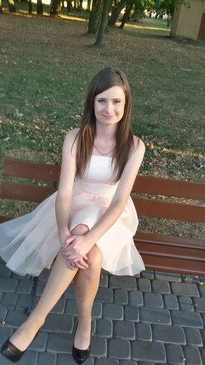 Cute dolled up chick posing outdoors