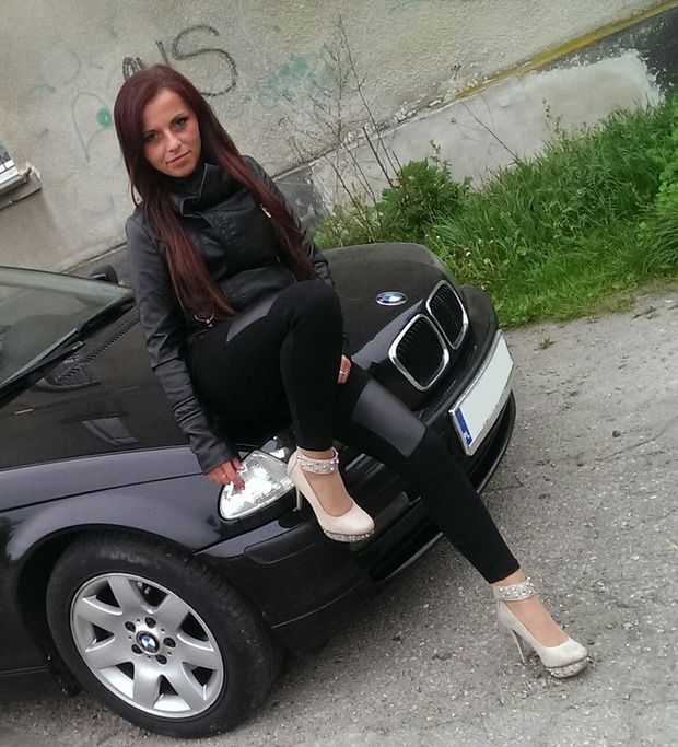 Bimbo type chick posing outdoors
