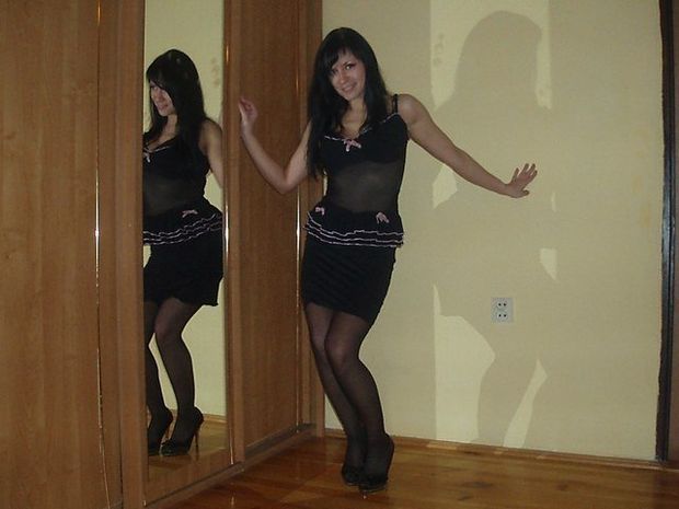 Slutty style outfit on a tanned brunette bimbo