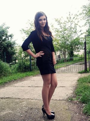 Young rookie in nice black hot outfit