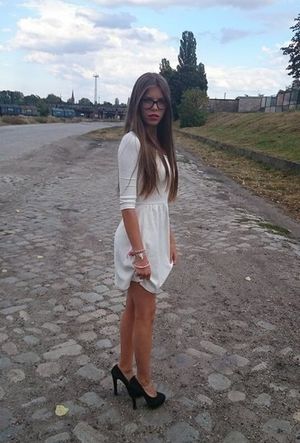 Rookie in white dress and black heels