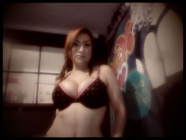 Petite redhead with huge sexy tits