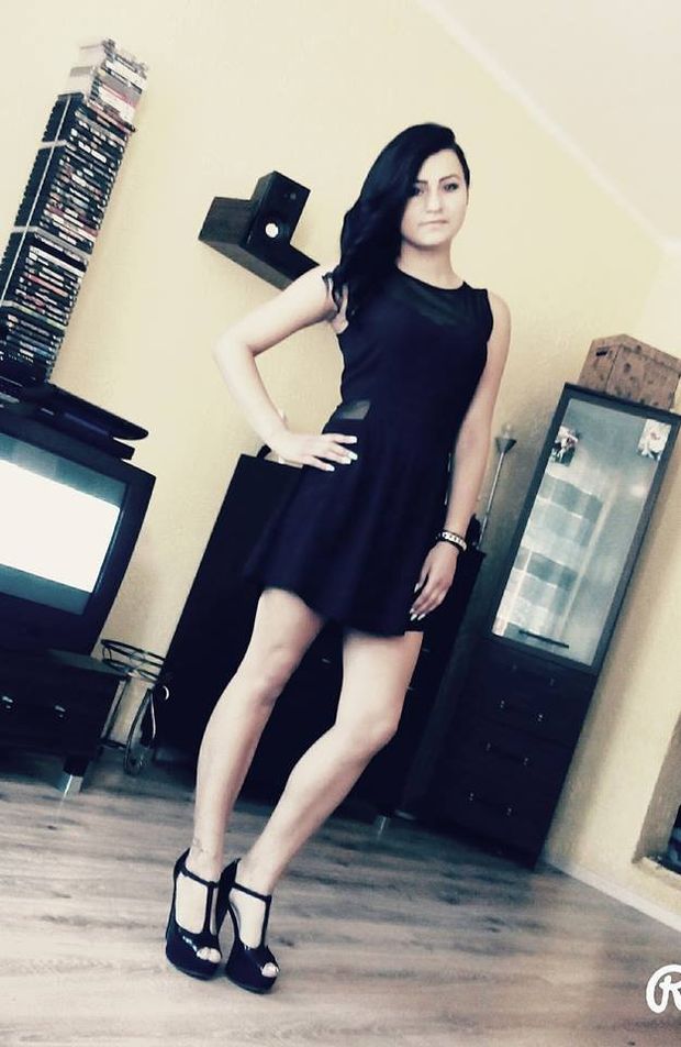 Young dark hair hottie in nice sexy dress