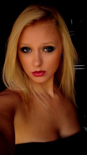Dolled up bimbo with strong makeup perfect for future cumshots
