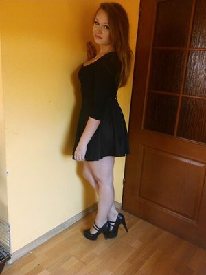 Curvy sexy redhead chick at home