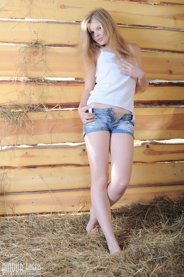 Perfect teen sweety strips nude in the barn to demonstrate her lovely petite body on camera.