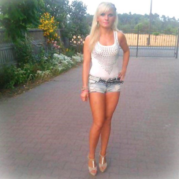Dolledup blonde bimbo in slutty shorts outdoors