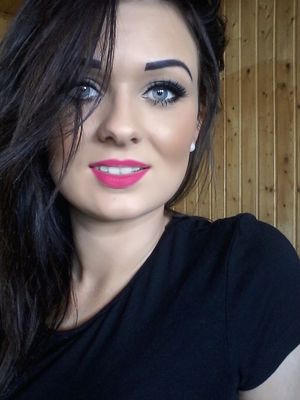 Dolled up brunette bimbo